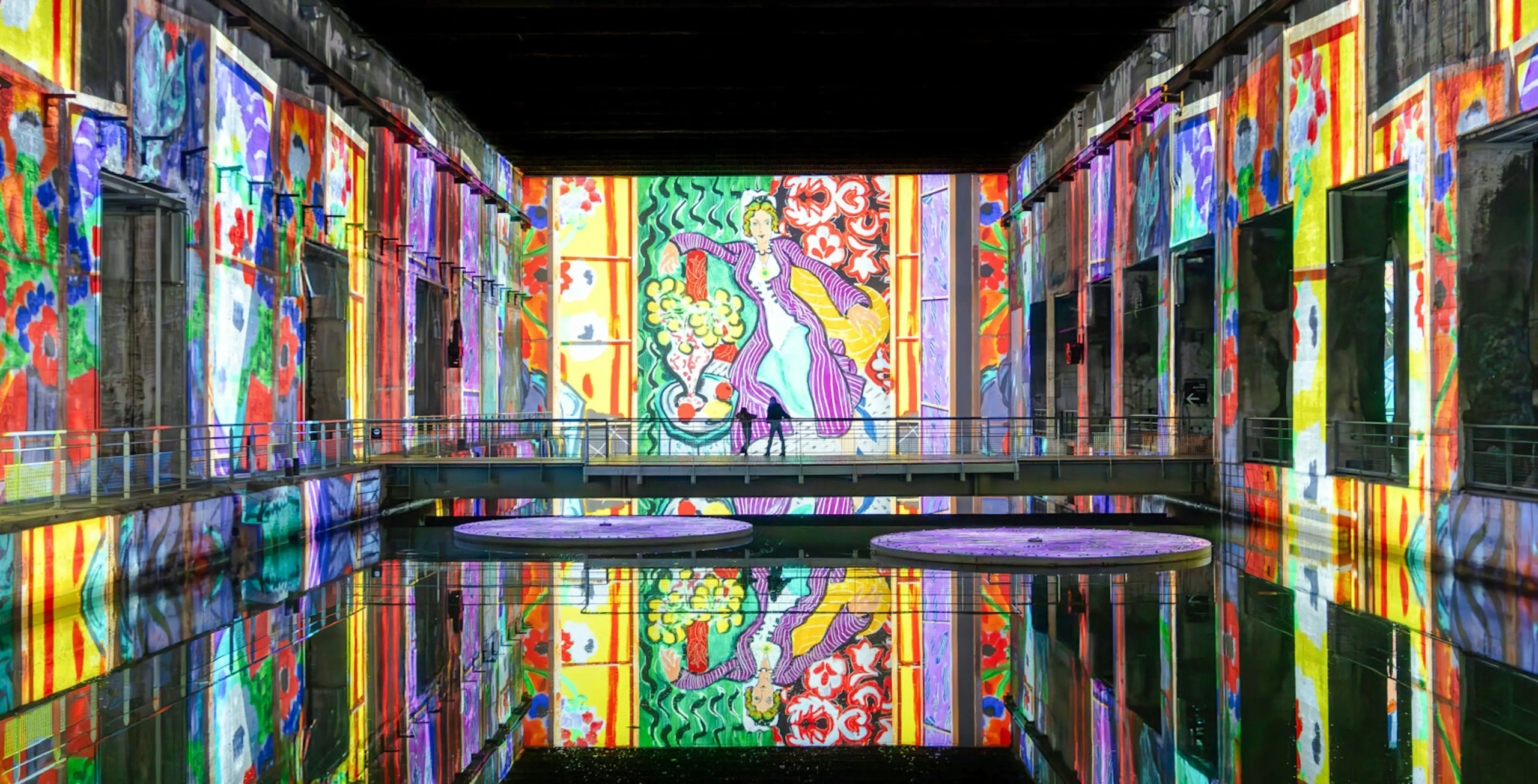 Immersive digital art exhibition titled "Matisse, Symphony of Colors," presented at the Bassins des Lumi&egrave;res in Bordeaux
